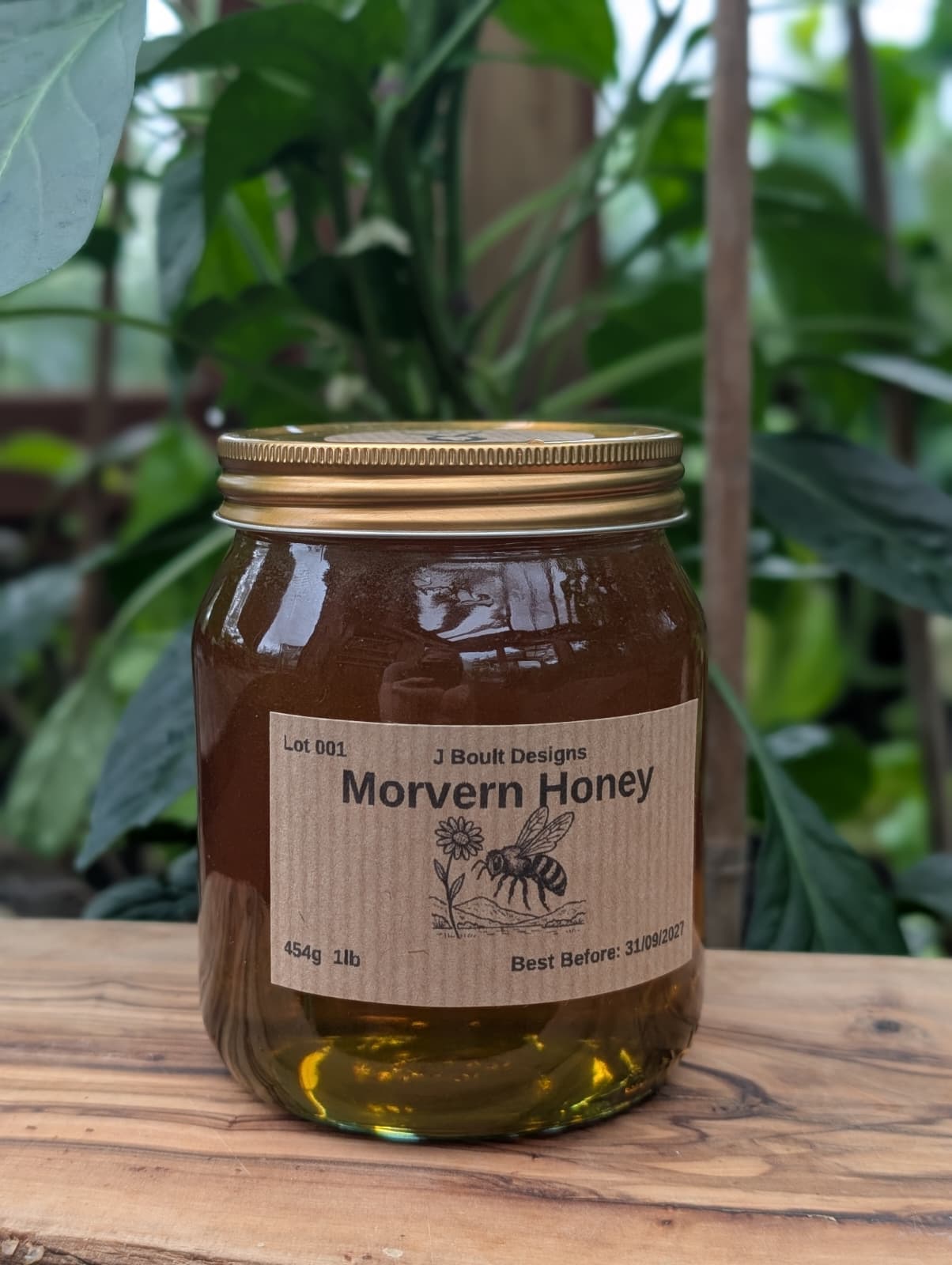 Jar of Morvern Honey on a wooden surface with a natural background